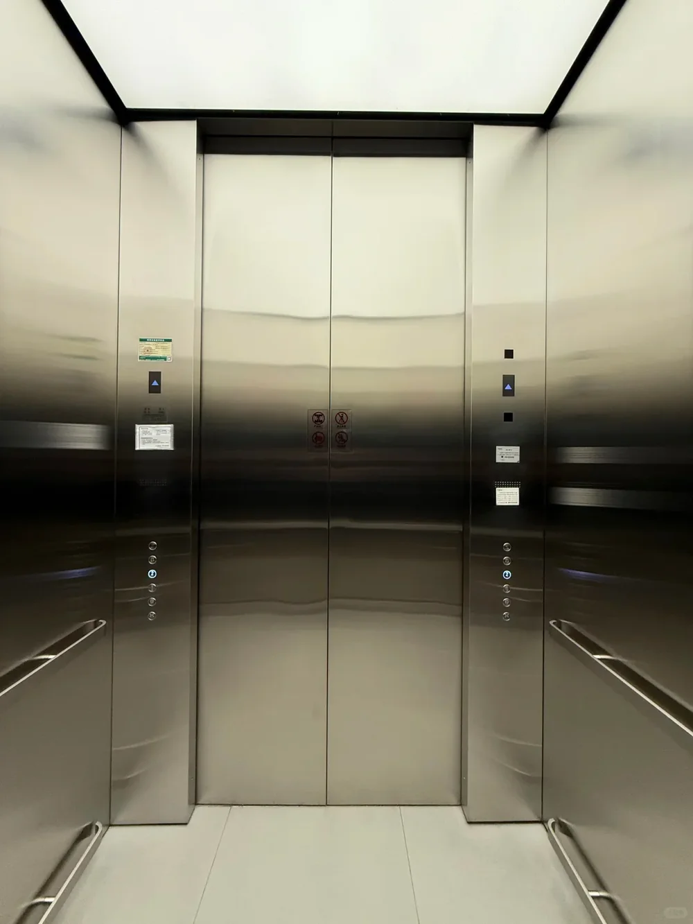 Stainless steel passenger elevator cabin with ceiling lighting